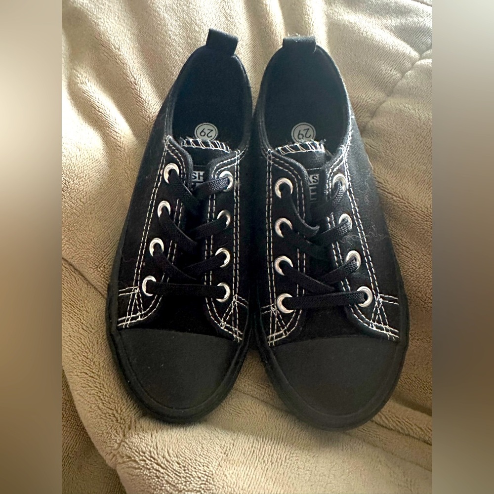 Girls or boys sneakers. 29